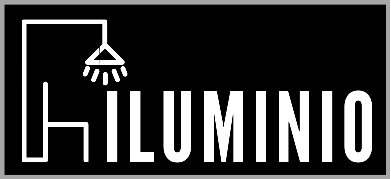 A black rectangular logo with a white line drawing of a chair and a pendant lamp on the left. The word ILUMINIO is written in bold white capital letters on the right.